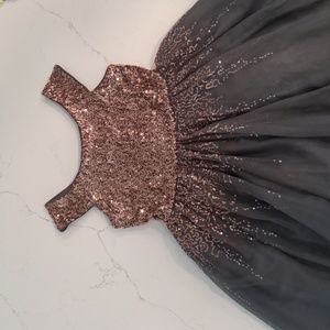 Stunning holiday or party dress. Girls size 10. Zunie bought at Dillard's.